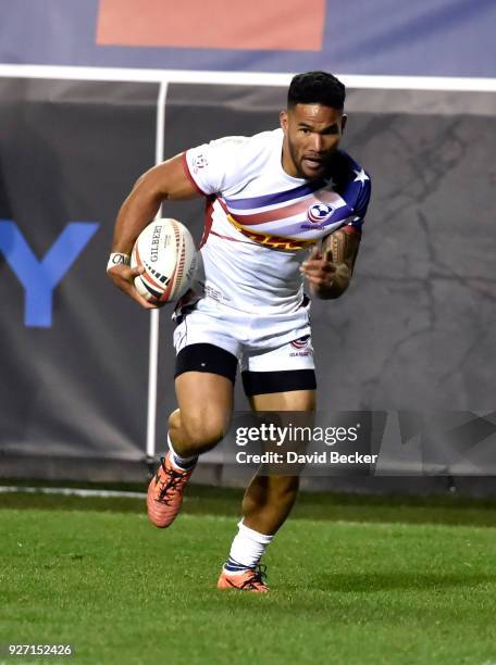 Martin Iosefo of the United States runs with the ball against Australia during the USA Sevens Rugby tournament at Sam Boyd Stadium on March 2, 2018...