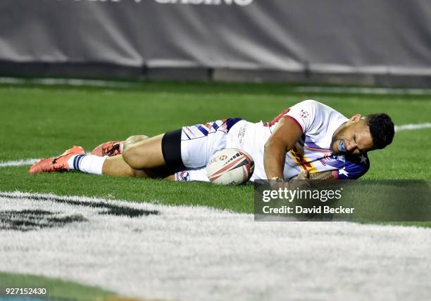 Martin Iosefo of the United States reacts after scoring a try against Australia during the USA Sevens Rugby tournament at Sam Boyd Stadium on March...