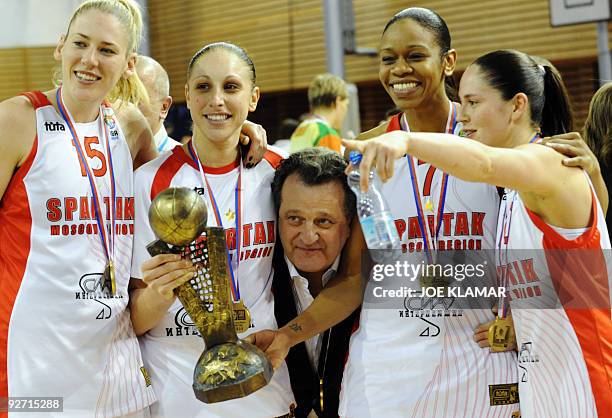 The owner of Spartak Moscow Shabtai von Kalmanovic pokes his head between through his players Lauren Jaskcon, Diana Taurasi, Tina Thomson and Sue...