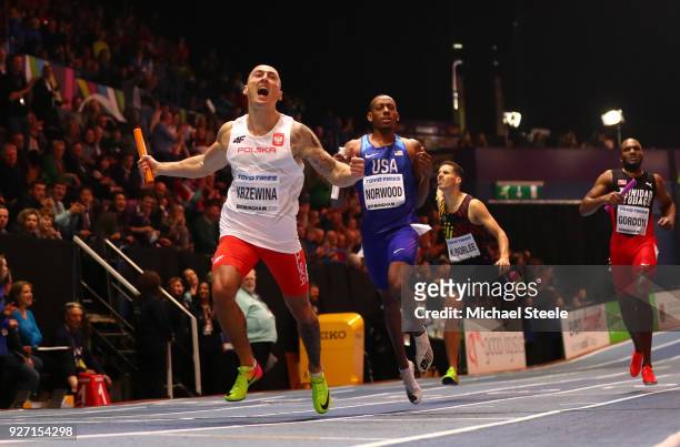 Gold Medallist, Jakub Krzewina of Poland celebrates winning the Men's 4 x 400 Metres Relay Final during the IAAF World Indoor Championships on Day...