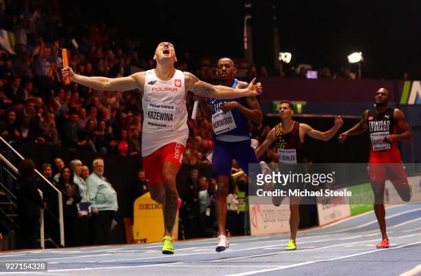 Gold Medallist, Jakub Krzewina of Poland celebrates winning the Men's 4 x 400 Metres Relay Final during the IAAF World Indoor Championships on Day...