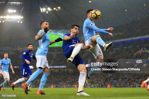 Alvaro Morata of Chelsea battles with Aymeric Laporte of Man City during the Premier League match between Manchester City and Chelsea at the Etihad...