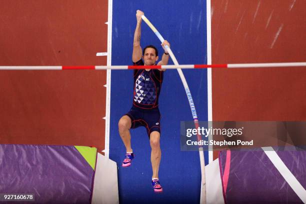 Renaud Lavillenie of France competes in the Men's Pole Vault Final during the IAAF World Indoor Championships on Day Four at Arena Birmingham on...