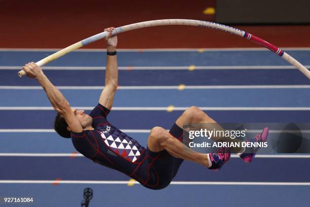 France's Renaud Lavillenie clearing 5.90m in the men's pole vault final at the 2018 IAAF World Indoor Athletics Championships at the Arena in...