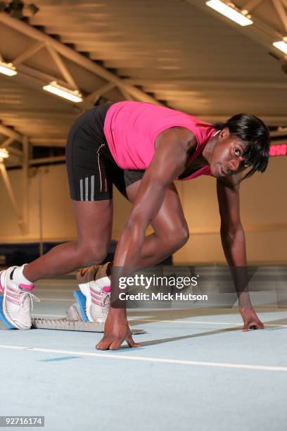 English runner Christine Ohuruogu poses on starting blocks for a portrait session at Lea Valley Athletics Centre on December 16th, 2008 in London.