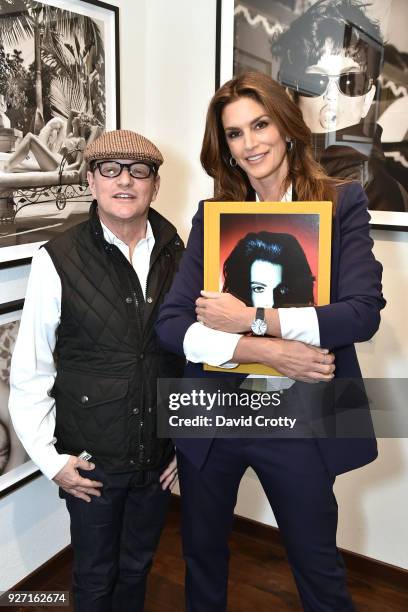Artist Matthew Rolston and event host supermodel Cindy Crawford at Rolston's Hollywood Royale exhibition preview at Fahey/Klein Gallery on March 1,...