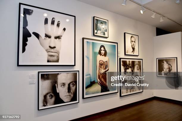Installation view featuring George Michael, Mikhail Baryshnikov, Isabella Rossellini, Andie MacDowell, Drew Barrymore, Molly Ringwald, and Brigitte...