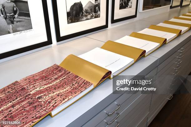 Multiple copies of the Hollywood Royale book ready to be signed by the artist at Rolston's Hollywood Royale exhibition preview at Fahey/Klein Gallery...