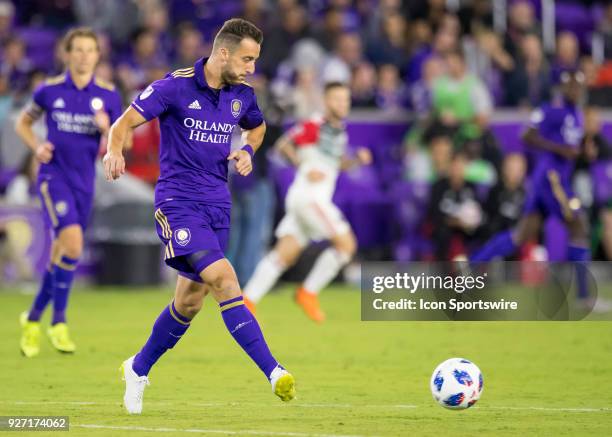 Orlando City defender RJ Allen passes the ball during the MLS soccer match between the Orlando City SC and DC United on March, 3rd 2018 at Orlando...