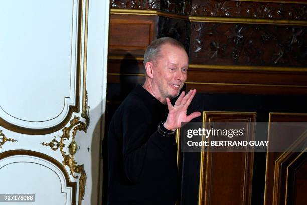 British fashion designer Bill Gaytten for John Galliano acknowledges the audience during the 2018/2019 fall/winter collection fashion show on March...