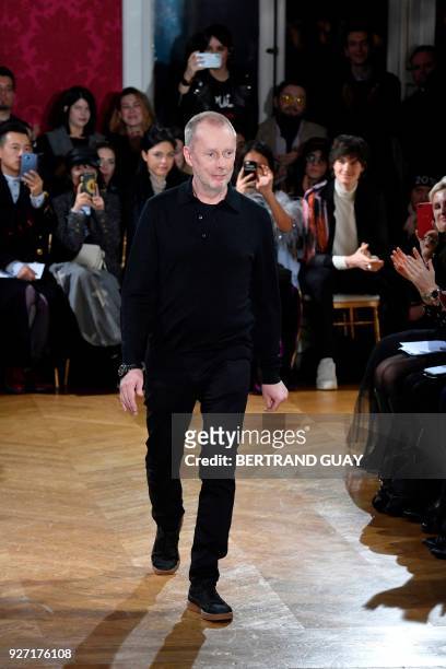 British fashion designer Bill Gaytten for John Galliano acknowledges the audience during the 2018/2019 fall/winter collection fashion show on March...