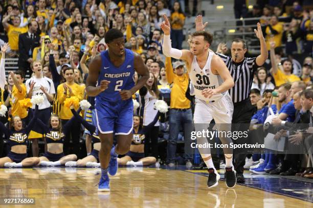 Marquette Golden Eagles guard Andrew Rowsey reacts after making a three pointer during a game between the Marquette Golden Eagles and the Creighton...