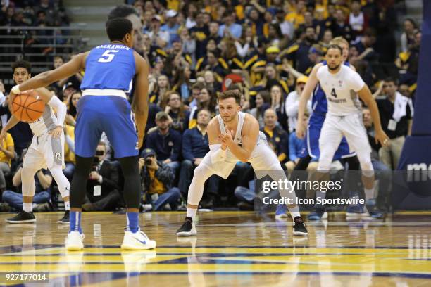 Marquette Golden Eagles guard Andrew Rowsey waits for Creighton Bluejays guard Ty-Shon Alexander to make a move during a game between the Marquette...