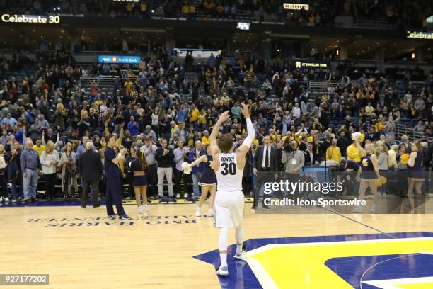 Marquette Golden Eagles guard Andrew Rowsey waves to the crowd following a game between the Marquette Golden Eagles and the Creighton Blue Jays on...