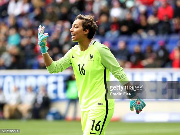 Sarah Bouhaddi of France directs her teammates in the first half against the United States of America during the SheBelieves Cup at Red Bull Arena on...