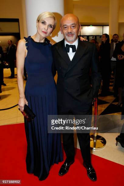 Melita Toscan du Plantier and Christian Louboutin arrive at the Cesar Film Awards 2018 At Salle Pleyel on March 2, 2018 in Paris, France.