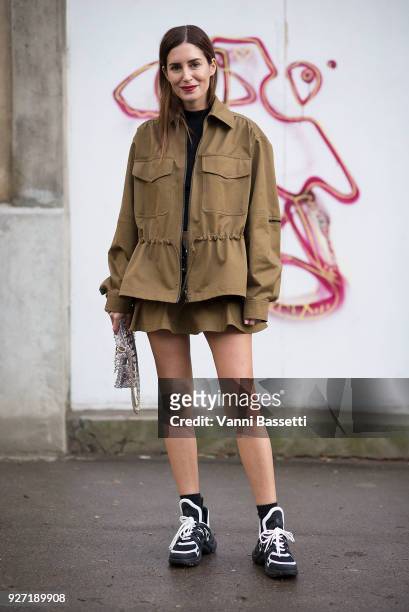 Gala Gonzalez poses wearing Louis Vuitton sneakers after the Valentino show at Les Invalides during Paris Fashion Week Womenswear FW 18/19 on March...