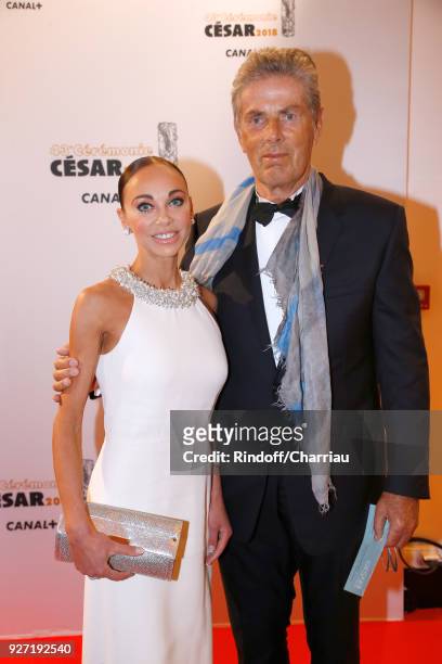 Chief Executive of the Lucien Barriere Group, Dominique Desseigne and Alexandra Cardinale attend the Cesar Film Awards 2018 at Salle Pleyel on March...