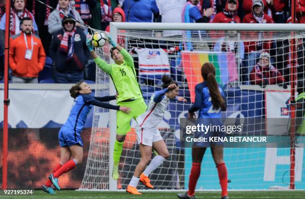 France's Sarah Bouhaddi saves the ball during a SheBelieves Cup soccer match between France and the US at the Red Bulls Stadium on March 4, 2018 in...