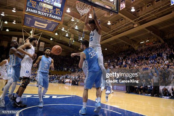 Marvin Bagley III of the Duke Blue Devils reacts after dunking the ball against Luke Maye of the North Carolina Tar Heels at Cameron Indoor Stadium...