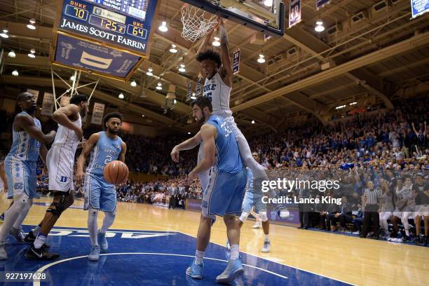 Marvin Bagley III of the Duke Blue Devils reacts after dunking the ball against Luke Maye of the North Carolina Tar Heels at Cameron Indoor Stadium...