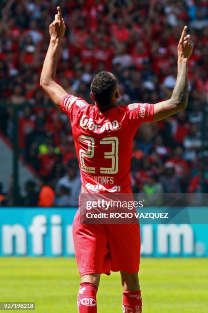 Toluca's Colombian player Luis Quinones celebrates his goal against Pachuca, during the Mexican Clausura tournament football match, at the Nemesio...