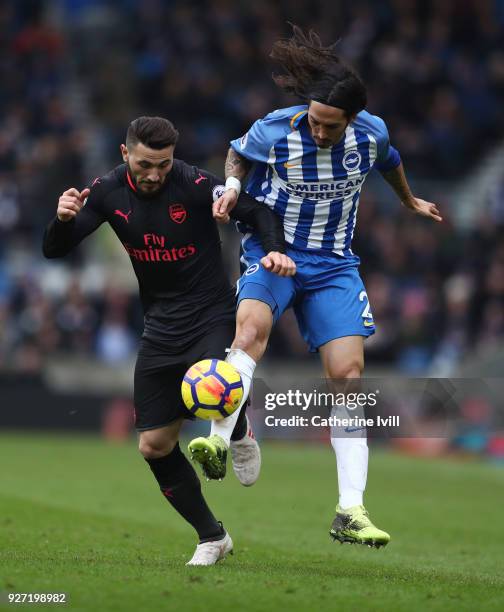Sead Kolasinac of Arsenal battles with Matias Ezequiel Schelotto of Brighton and Hove Albion during the Premier League match between Brighton and...