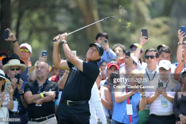 Phil Mickelson of the United States plays his second shot on the second hole during the final round of the World Golf Championships-Mexico...