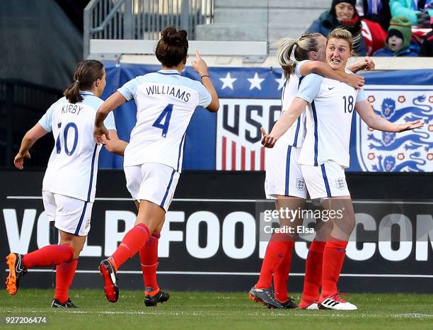 Ellen White of England celebrates her goal with teammates Fran Kirby and Fara Williams in the first half against Germany during the SheBelieves Cup...