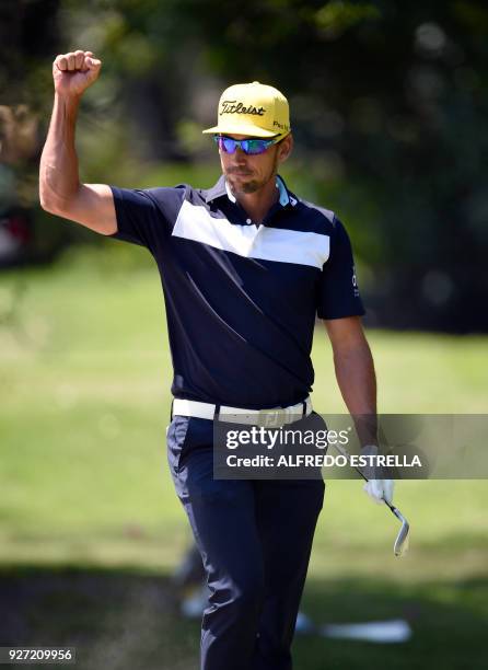 Spanish golfer Rafa Cabrera Bello celebrates his birdie at green one, during the fourth and last round of the World Golf Championship in Mexico City,...