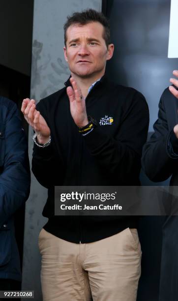 Former rider Thomas Voeckler of France in his new role of ambassador for ASO, organizer of Paris-Nice and Tour de France among others during stage 1...
