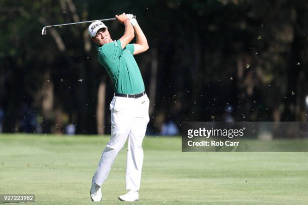 Justin Thomas plays his second shot from the 18th fairway to make eagle during the final round of World Golf Championships-Mexico Championship at...
