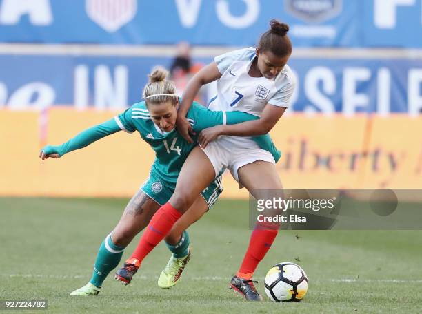 Anna Blässe of Germany and Nikita Parris of England fight for the ball in the second half during the SheBelieves Cup at Red Bull Arena on March 4,...