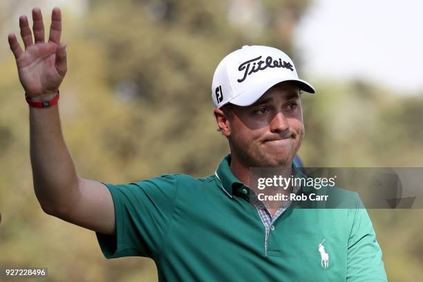 Justin Thomas reacts after making an eagle on the 18th hole during the final round of World Golf Championships-Mexico Championship at Club De Golf...