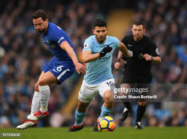 Sergio Aguero of Manchester City breaks away from Danny Drinkwater of Chelsea during the Premier League match between Manchester City and Chelsea at...