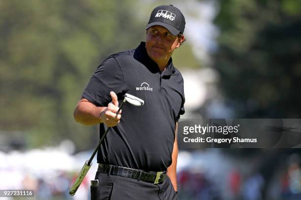 Phil Mickelson makes a par on the 9th green during the final round of World Golf Championships-Mexico Championship at Club De Golf Chapultepec on...
