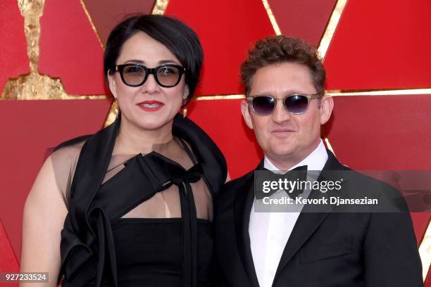 Ramsey Ann Naito and Alex Winter attend the 90th Annual Academy Awards at Hollywood & Highland Center on March 4, 2018 in Hollywood, California.