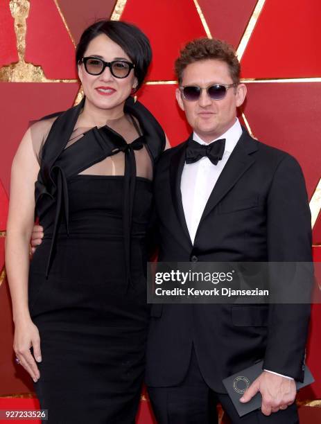 Ramsey Ann Naito and Alex Winter attend the 90th Annual Academy Awards at Hollywood & Highland Center on March 4, 2018 in Hollywood, California.