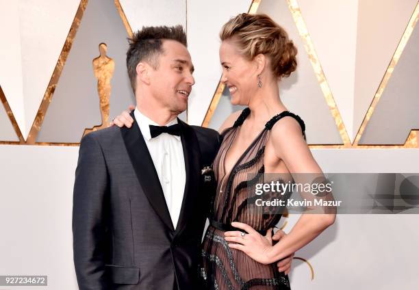 Sam Rockwell and Leslie Bibb attend the 90th Annual Academy Awards at Hollywood & Highland Center on March 4, 2018 in Hollywood, California.