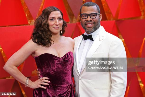 Director Jordan Peele and his wife US comedian Chelsea Peretti arrives for the 90th Annual Academy Awards on March 4 in Hollywood, California. / AFP...