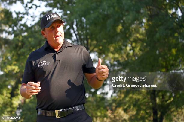 Phil Mickelson gives a thumb up to fans on the 17th tee during the final round of World Golf Championships-Mexico Championship at Club De Golf...
