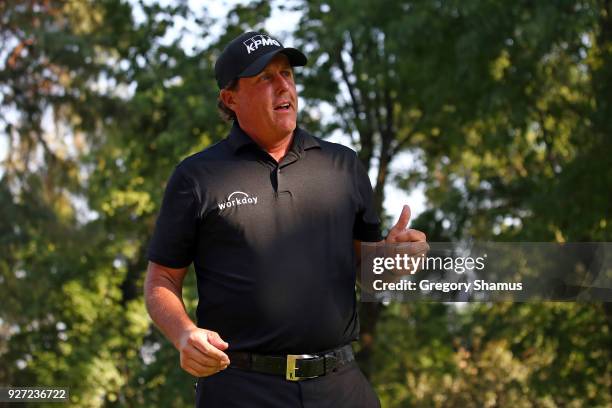 Phil Mickelson gives a thumb up to fans on the 17th tee during the final round of World Golf Championships-Mexico Championship at Club De Golf...