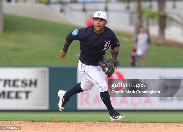 Alexi Amarista of the Detroit Tigers fields during the Spring Training game against the Atlanta Braves at Publix Field at Joker Marchant Stadium on...