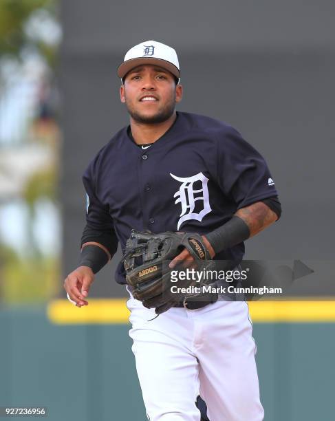 Alexi Amarista of the Detroit Tigers looks on during the Spring Training game against the Atlanta Braves at Publix Field at Joker Marchant Stadium on...