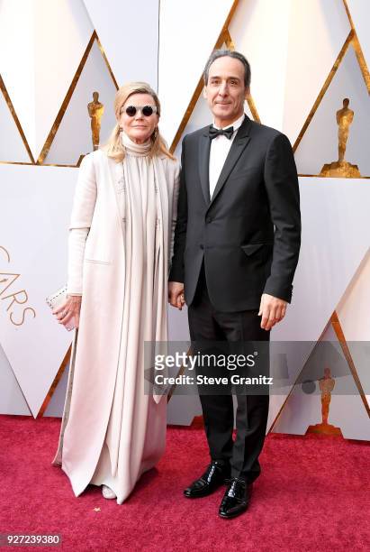 Dominique Lemonnier and Alexandre Desplat attend the 90th Annual Academy Awards at Hollywood & Highland Center on March 4, 2018 in Hollywood,...