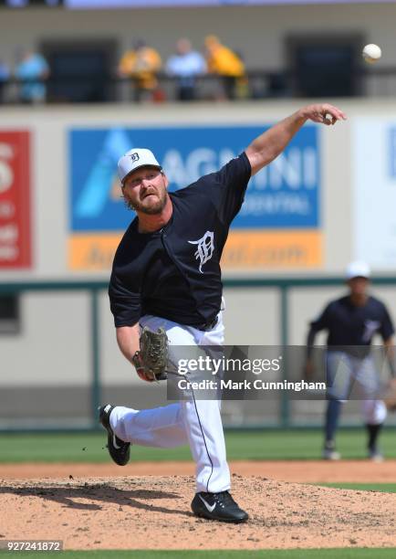 Travis Wood of the Detroit Tigers pitches during the Spring Training game against the Atlanta Braves at Publix Field at Joker Marchant Stadium on...