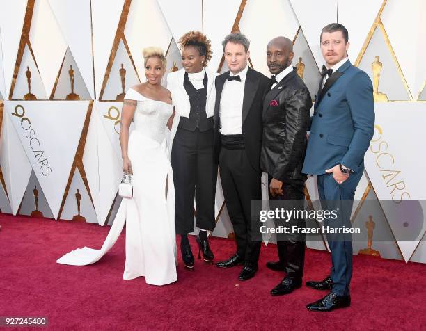 Mary J. Blige, Dee Rees, Jason Clarke, Rob Morgan, and Garrett Hedlund attend the 90th Annual Academy Awards at Hollywood & Highland Center on March...