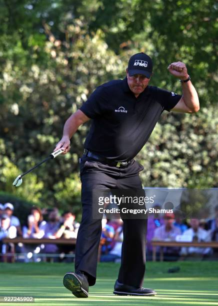 Phil Mickelson reacts after making a birdie on the 16th hole during the final round of World Golf Championships-Mexico Championship at Club De Golf...