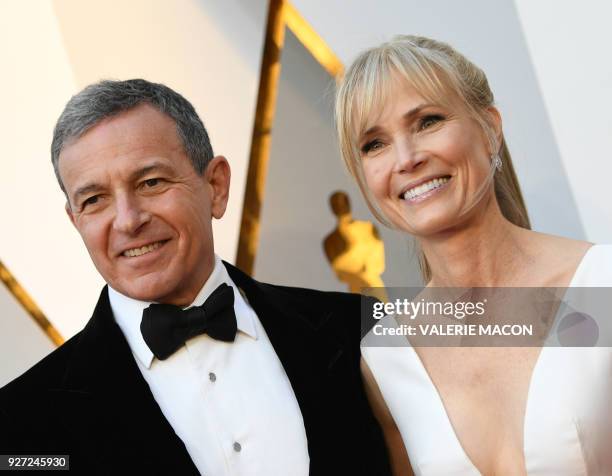Bob Iger and Willow Bay arrive for the 90th Annual Academy Awards on March 4 in Hollywood, California. / AFP PHOTO / VALERIE MACON