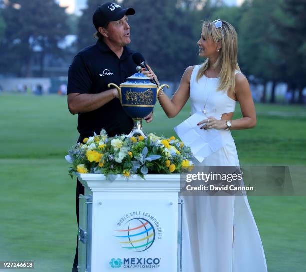 Phil Mickelson of the United States is interviewed by Ines Sainz of TV Azteca after his play-off win during the final round of the World Golf...